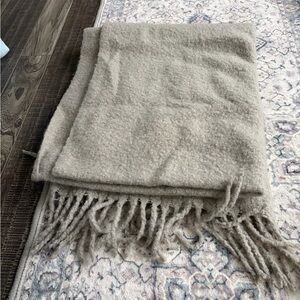 Long gray fuzzy scarf with fringe ends